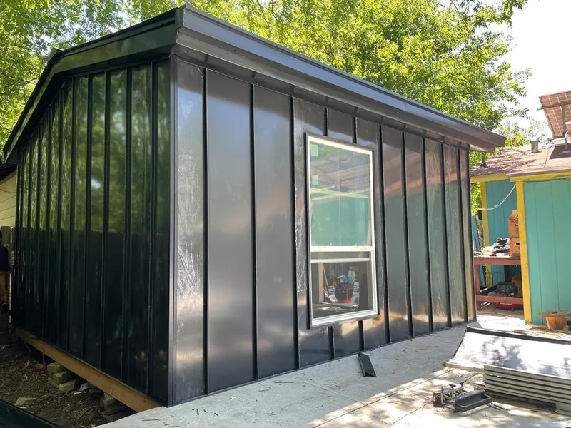 Black standing seam metal wall panels for Roof Inspection in Ventnor City